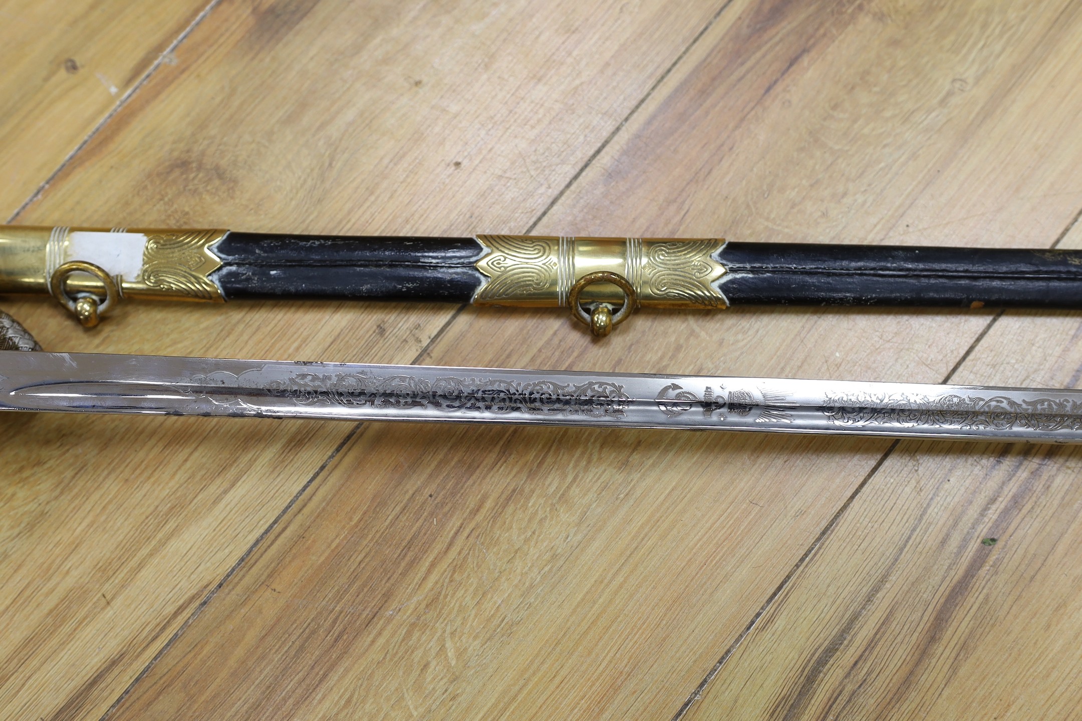 A QEII Naval officer's dress sword and scabbard